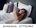 Good dreams make your day better. Attractive young woman sleeping joyfully