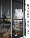 Small photo of Zaandam, Netherlands, February 10, 2021:Shop window with the famous Dutch rabbit Miffy.