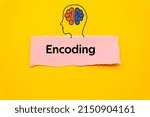 Small photo of Encoding.The word is written on a slip of colored paper. Psychological terms, psychologic words, Spiritual terminology. psychiatric research. Mental Health Buzzwords.