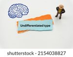 Small photo of Undifferentiated type.The word is written on a slip of colored paper. Psychological terms, psychologic words, Spiritual terminology. psychiatric research. Mental Health Buzzwords.