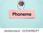 Small photo of Phoneme.The word is written on a slip of colored paper. Psychological terms, psychologic words, Spiritual terminology. psychiatric research. Mental Health Buzzwords.