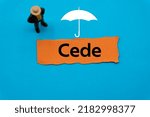 Small photo of Cede.The word is written on a slip of colored paper. Insurance terms, health care words, Life insurance terminology. business Buzzwords.