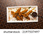 Small photo of Mutton Sheek Kabab or mutton seekh kebab with sauce served in a dish isolated on table background top view of bangladesh food