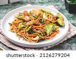 Small photo of Pancit Canton it is a type of Lo Mein or tossed noodles known as flour sticks. This dish is often served during birthdays and special occasions to symbolize long life.