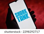 Small photo of Closeup view of the Shark Tank logo on the mobile screen. It is an American reality television series that features aspiring entrepreneurs pitching their business ideas: Dhaka, Bangladesh- May 5, 2023