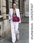 Small photo of Paris, France - February 28, 2019: Street style outfit - Leonie Hanne before a fashion show during Paris Fashion Week - PFWFW19