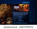 Small photo of Doom Eternal PC game poster on Steam game store application laptop screen. Doom Eternal is a first-person shooter game. Ankara, Turkey - May 23, 2023.