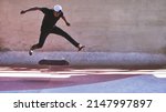 Small photo of Take a chance. Shot of a young man doing tricks on his skateboard at the skatepark.