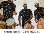 Small photo of Their beats will keep you moving and grooving. Shot of a group of musical performers playing together indoors.