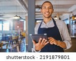 Restaurant entrepreneur with tablet, leaning on door and open to customers portrait. Owner, manager or employee of a startup fast food store, cafe or coffee shop business standing happy with a smile
