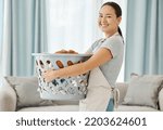 Small photo of Happy Asian cleaner woman with laundry working for home, house or hotel hospitality cleaning help service agency. Japanese girl maid or worker smile in apartment with dirty clothes in washing basket