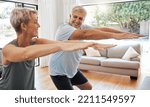 Small photo of Fitness, retirement and couple squat in home for senior body wellness and vitality in Canada. Happy elderly people in marriage enjoy stretching workout to bond together in living room.