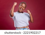 Celebration, black woman and excited person showing happiness and winner feeling. Winning motivation, achievement and happy smile of a female win with a celebrate victory feeling from success