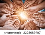 Small photo of Make this world a brighter place. Cropped shot of a diverse group of people holding out their cupped hands.