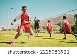 Small photo of Soccer, children and training or practice for sports competition or game on soccer field for fitness, exercise and energy. Football player, cone and sport with kids coach outdoor for team practice