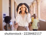 Small photo of Black woman, teacher and headache stress at school, academy or learning campus with blurred background. Africa woman, portrait and pain for mental health, burnout or tired in education workplace
