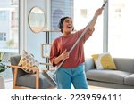 Small photo of Dance, radio or woman cleaning with music for singing or listening to a song with broom as a guitar at home. Relax, freedom or happy Indian girl cleaner streaming audio on headphones or housekeeping