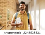 Small photo of Face portrait, student and man in university ready for back to school learning, goals or targets. Scholarship, education and happy, confident and proud male from India holding tablet for studying.
