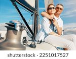 Small photo of Wealth, rich and couple vacation on a yacht at sea as retirement investment feeling happy, excited and enjoying travel holiday. Luxury, romantic and joyful baby boomers on an anniversary boat cruise