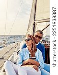 Small photo of Retirement, investment and luxury with couple on yacht for summer, relax and wealth on Bali trip. Travel, love and ship with baby boomers man and woman sailing on boat for tropical vacation at sea