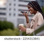 Business, phone call and black woman in city for networking, communication and in conversation. Corporate worker, travel commute and girl recording voice note, walking and talking in New York street