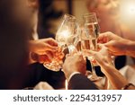 Success, hands or toast in a party for goals, winning deal or new year at luxury social event celebration. Motivation, team work or people cheers with champagne drinks or wine glasses at dinner gala