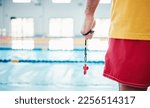 Hands  lifeguard and whistle by ...