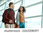 Small photo of Travel, love and happy with interracial couple in airport for vacation, tourism and departure. International trip, luggage and holiday with man and black woman walking for flight, journey or airline