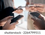 Hands, phone and people networking on social media, mobile app or chatting on mockup screen. Hand of group holding smartphone in circle for online network share, data sync or communication on display