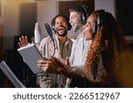Small photo of Team, people in recording studio singing and mic, sound equipment with music and artist, diversity and collaboration. Audio, headphones and musician group with tablet, record label and creativity