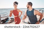 Small photo of Running, fitness and water with a sports couple outdoor during summer for cardio or endurance exercise. Health, training and ocean with a man and woman runner on a promenade for a workout together