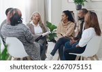 Counseling, group and psychology discussion with group of diversity people in therapy for depression, stress and anxiety. Men and women healing during psychologist meeting talking about mental health