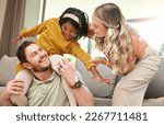 Small photo of Bonding, diversity and child with parents in foster care for love, happy and safety in a family home. Playful, smile and father, mother and African girl playing in an interracial house after adoption