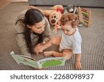 Small photo of Mother, baby and book for story for education on carpet in home, for learning and reading skills. Child, mom and teaching with storybook for development of mind, brain or thinking ability in house