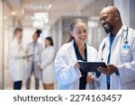 Doctors teamwork on tablet for hospital research management, employees workflow or software clinic solution. Healthcare people on digital tech for medical team analysis, results or problem solving