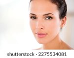 Small photo of Unblemished and perfect. Headshot of a beautiful woman with flawless skin.