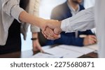 Small photo of B2b, shaking hands and thank you handshake of a corporate worker in a office. Business deal, partnership and we are hiring gesture with a female hr manager ready for onboarding welcome with trust
