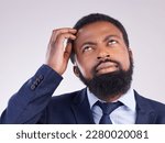 Small photo of Confused business man thinking in studio of ideas, doubt and remember questions in mindset. Black male model, scratching head and looking up for solution, decision and memory of why, risk and choice