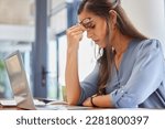 Stress, problem and business woman with headache, anxiety or workload pressure in office. Burnout, pain and financial advisor suffering migraine, ache or anxious while checking tax documents deadline