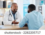 Small photo of Happy, talking and doctor with a black man for healthcare, support and advice on treatment. Smile, consulting and an African gp with a patient speaking about medicine, health and professional help