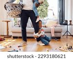 When youre having a bad day, just scream. a little boy throwing a tantrum while holding his parents leg at home.