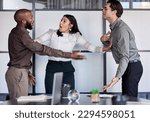 Small photo of How dare you speak to me like that. Shot of a young businesswoman trying to stop her two colleagues from fighting in an office.
