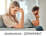 One young woman feeling frustrated and annoyed after an argument with her husband. A wife feeling distant after fighting due to marriage problems. A negative situation that could end up in divorce