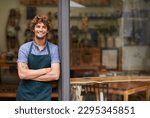 Welcome, arms crossed and portrait of man at restaurant for small business, coffee shop and waiter. Entrepreneur, happy and smile with male barista at front door of cafe for diner and food industry
