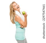 Small photo of Laughing her way to a svelte figure. a mature woman eating an apple against a studio background.