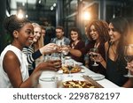 Small photo of Food, party and wine with friends at restaurant for celebration, pizza and social event. Happy, diversity and toast with group of people eating together for fine dining, cheers and free time