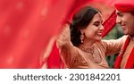 Small photo of Happy Indian couple, wedding and smile for love, compassion or romance together with care and joy. Hindu man and woman smiling in joyful happiness for marriage, tradition or red culture celebration