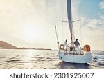 Small photo of Couple, yacht or sailing on vacation for adventure at sea with sun and waves to relax in summer. Ocean, people or cruise together for holiday on water for travel and sunshine for retirement lifestyle