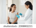 Injection, vaccine and patient at the clinic for consulting and help with prevention with a smile. Doctor, inject and woman on arm for virus with gloves in medical room for wellness or health.