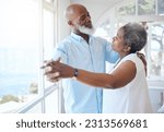 Small photo of Black couple, dancing and together in senior home with love, care and commitment. Happy african man and woman relax and dance to enjoy marriage, retirement and happiness while holding hands